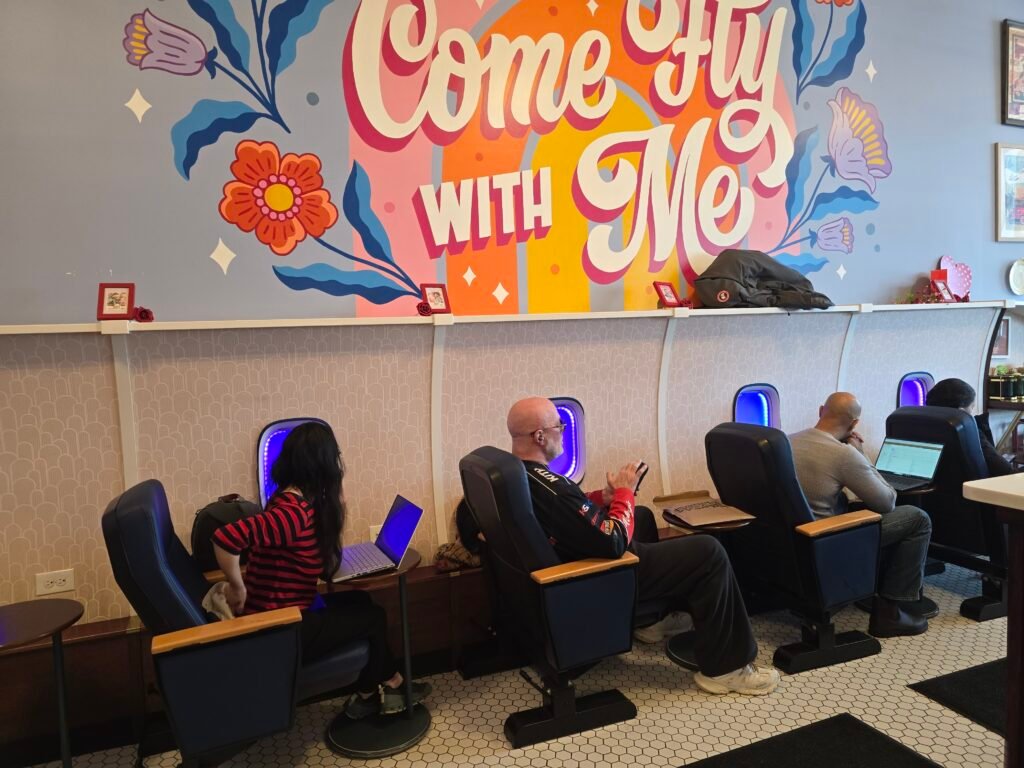 Airplane style seating and vibe inside Paper Plane Coffee Co. in Montclair, NJ