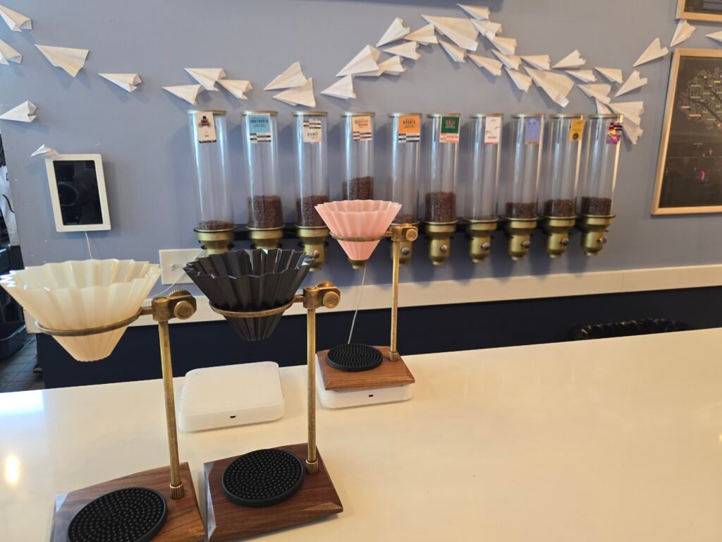 A pour over coffee featuring Santuario Colombia beans at Paper Plane Coffee