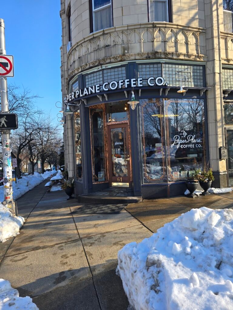 Exterior storefront of Paper Plane Coffee Co. cafe in Montclair, NJ