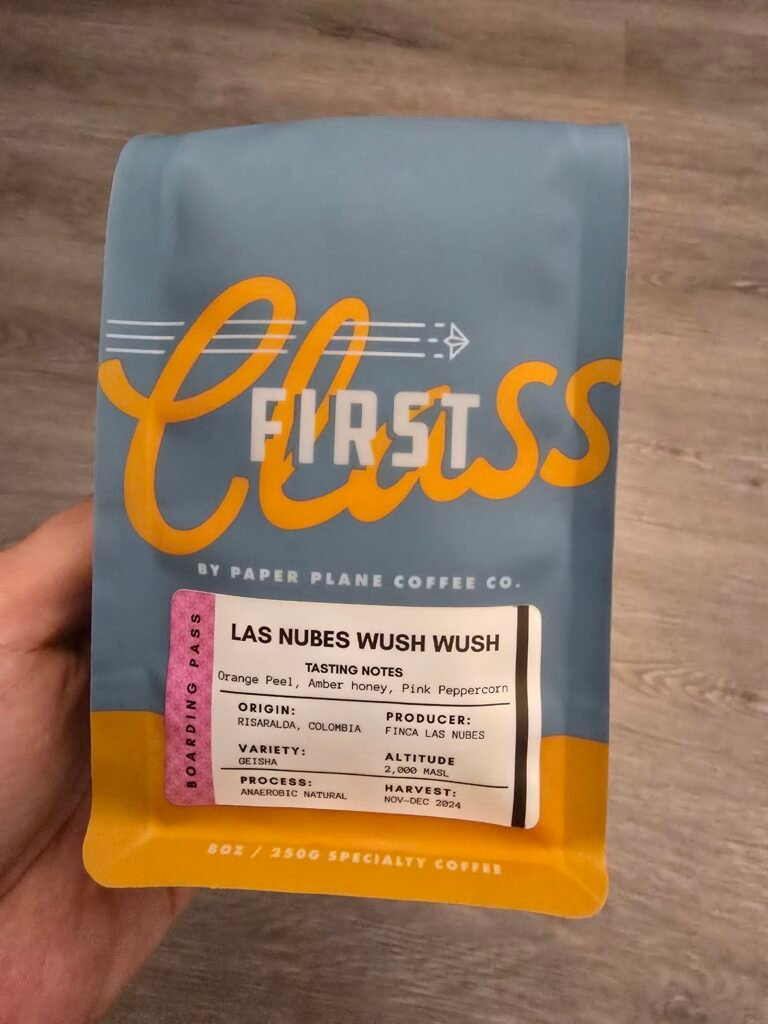 A bag of First Class Las Nubes Wush Wush coffee beans from Paper Plane Coffee